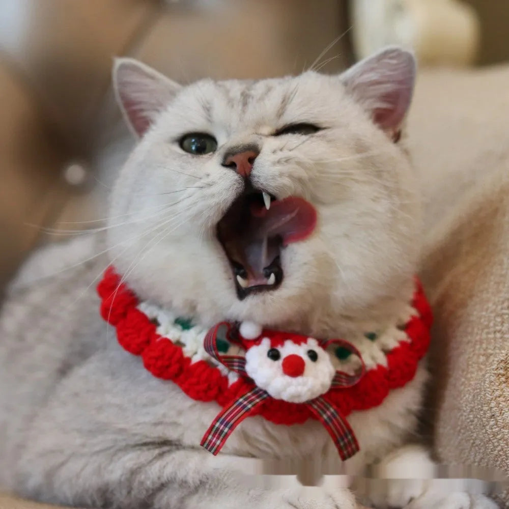 Knitted wool Christmas scarf for pets featuring festive patterns like striped Santa and elk, shown attached to a dog collar.