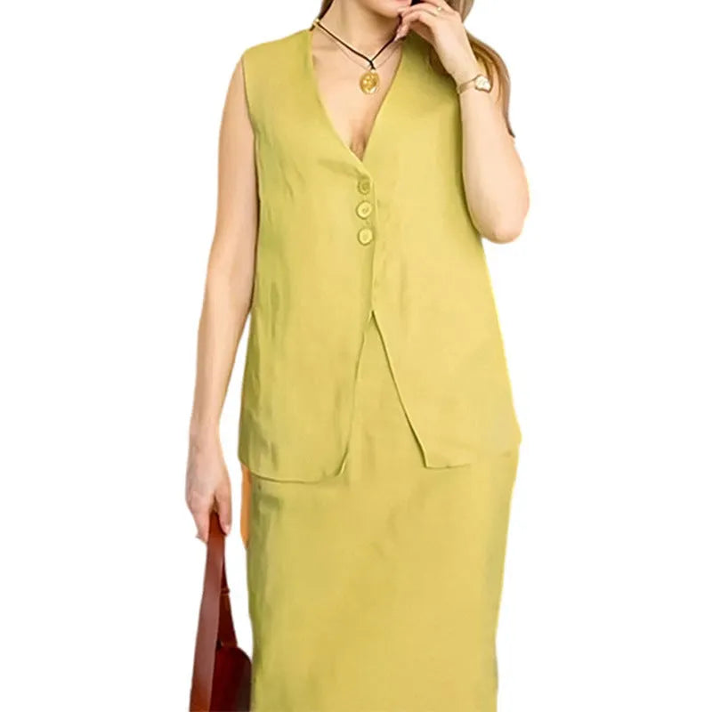 Women's white casual two-piece suit comprising a sleeveless vest and a long skirt on a hanger.