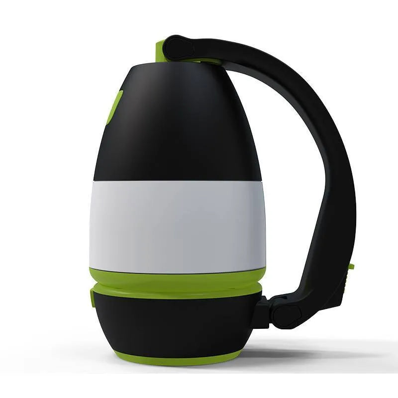 Black green multifunctional LED camping lamp with USB port shown next to a mobile phone.