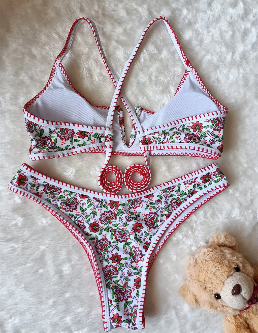 Women's floral print V-neck swimsuit with embroidery in blue and green colours