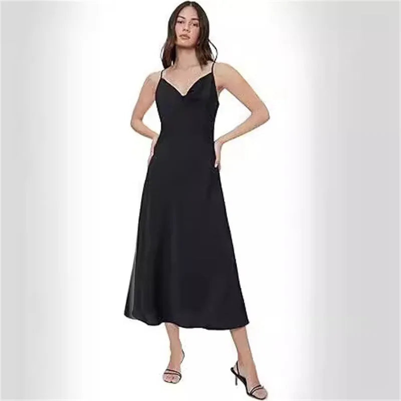 Strap satin open back dress in polyester, sleeveless, wide waist, available in red.