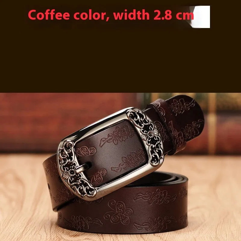 Thin black women's PU leather belt with alloy buckle fastening on jeans