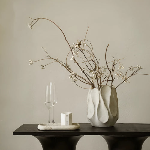 Irregular artistic ceramic vase in magnesium clay for flower arrangements, available in high and low style options