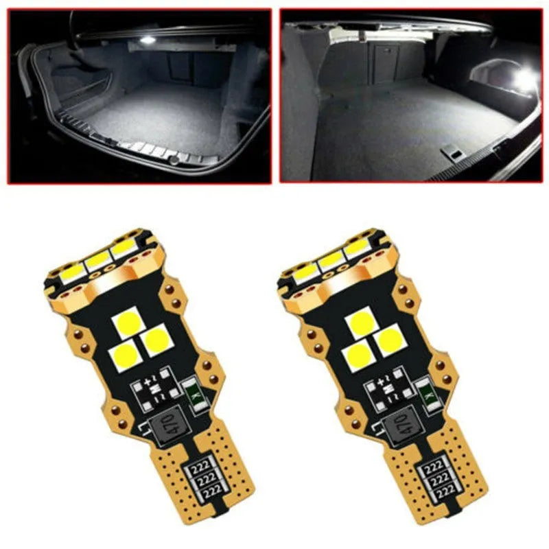 Single white T15 automotive reverse light bulb with PVC housing on a plain background.