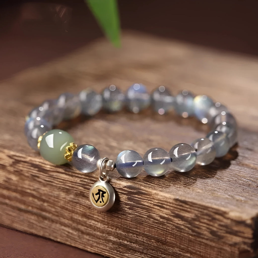 Moonstone crystal bracelet with 8mm beads showing Thousand-Hand Kwan-yin mouse design