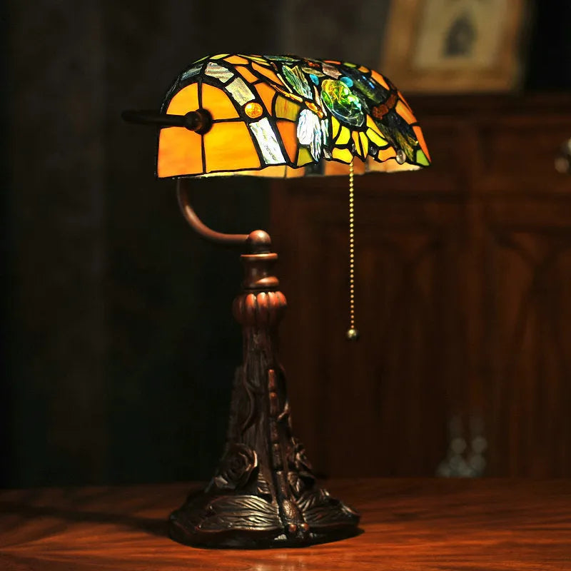 10-inch Tiffany table lamp with stained glass shade and resin base on a study desk