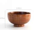 Set of four round wooden bowls in natural wood colour from 10x6.5cm to 11.8x6.7cm
