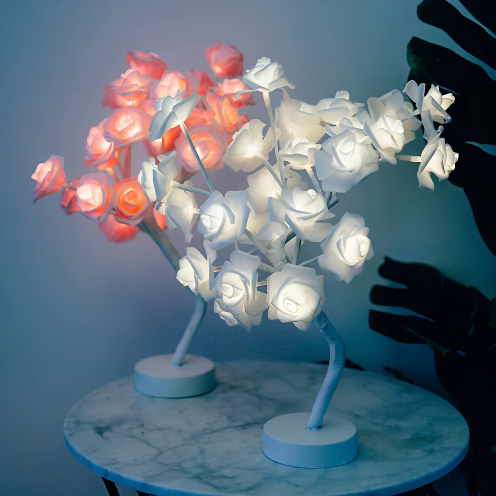 White and red rose flower LED table lamp with bonsai tree lights on a table.