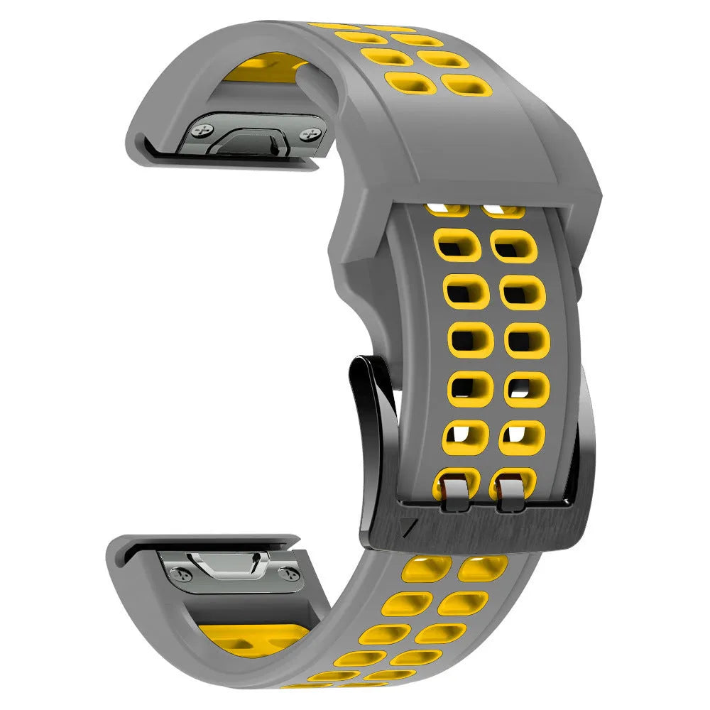 Two-colour quick-release silicone watch strap in black and lime green with pin buckle clasp.