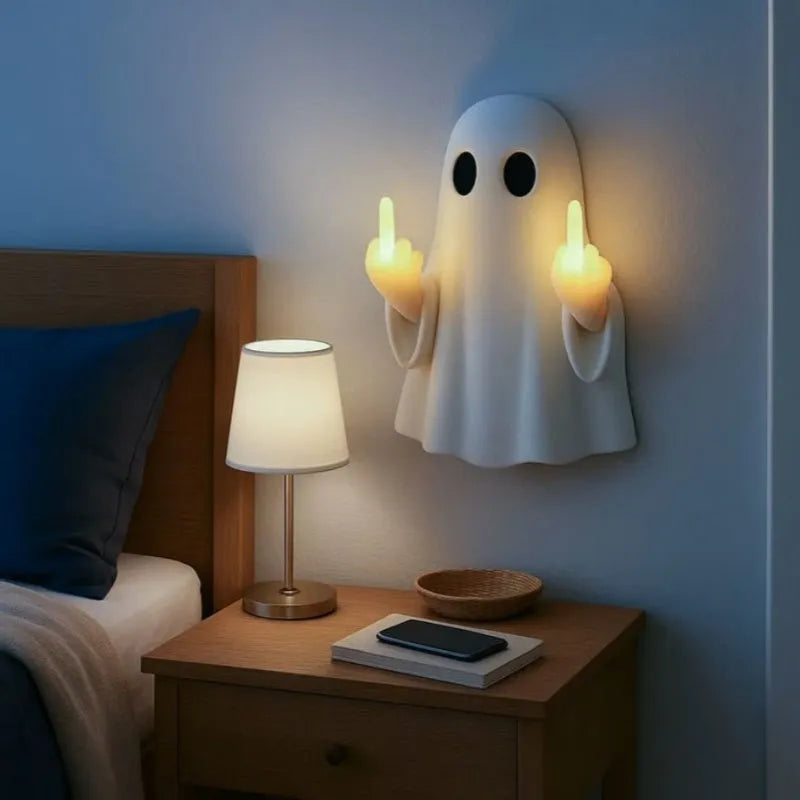 Plastic ghost statue night lamp in white with a modern simple style, 19.85cm tall, on a wooden shelf