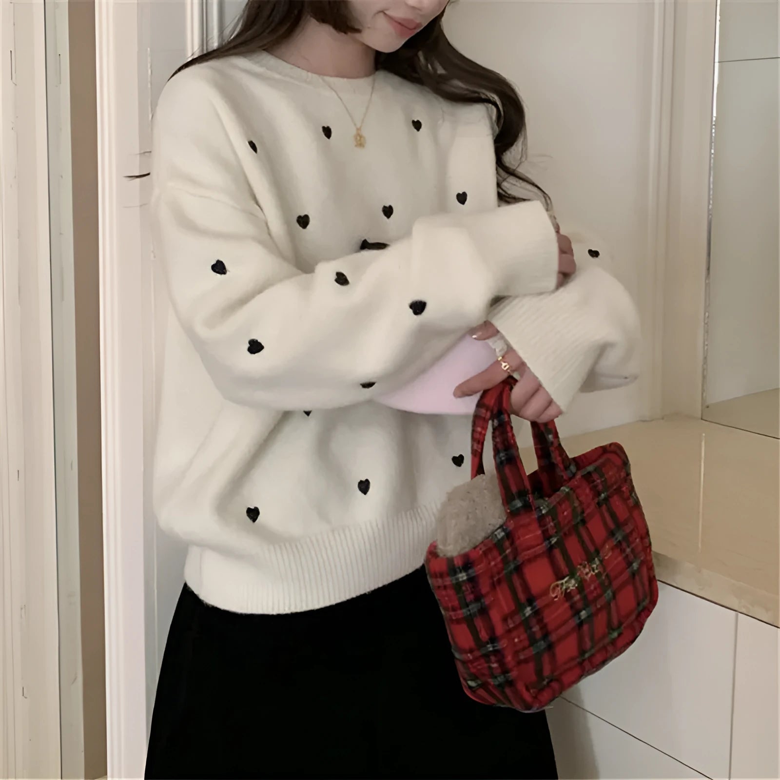 Women's loose acrylic pullover sweater with embroidery details in milky white colour