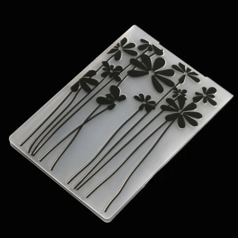 Plastic cake decorating mould set showing windmill, star, and flower patterns for sugar craft.