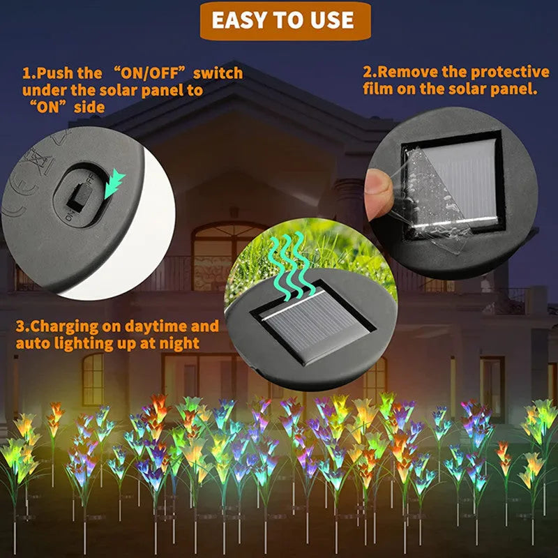 Solar lily flower light with silk cloth head, colour-changing LEDs, and stainless steel stake in a garden setting