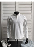 Men's patchwork stand-up collar sweater in black with asymmetric shoulder and long sleeves, loose fit