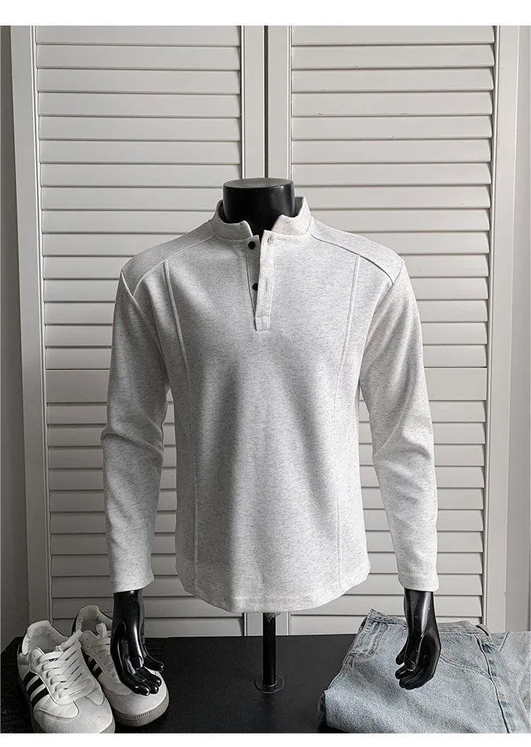 Men's patchwork stand-up collar sweater in black with asymmetric shoulder and long sleeves, loose fit