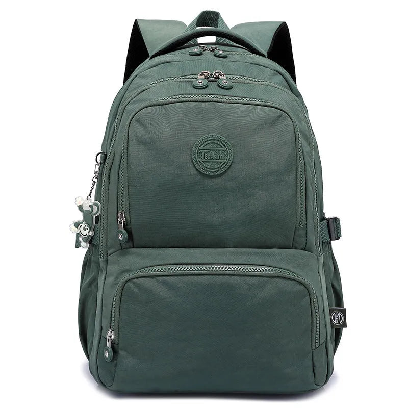 Nylon ultra light outdoor daily travel backpack with curved shoulder straps in olive green colour