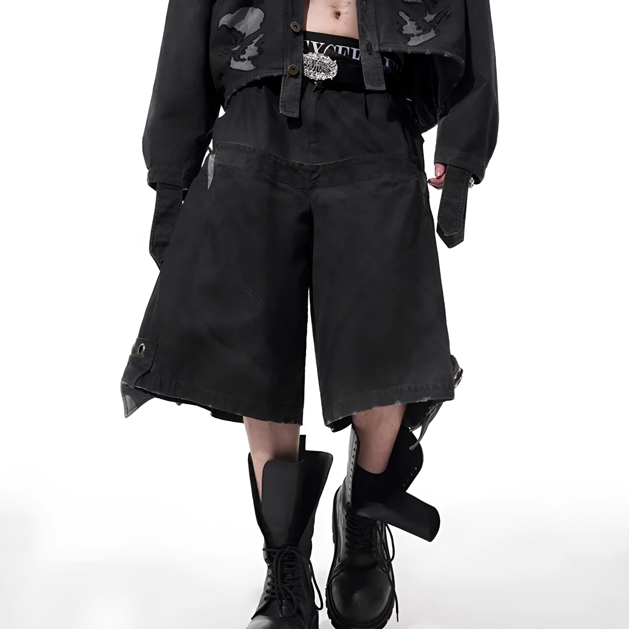 Men's black loose cropped trousers showing double waistband and washed stitching detail