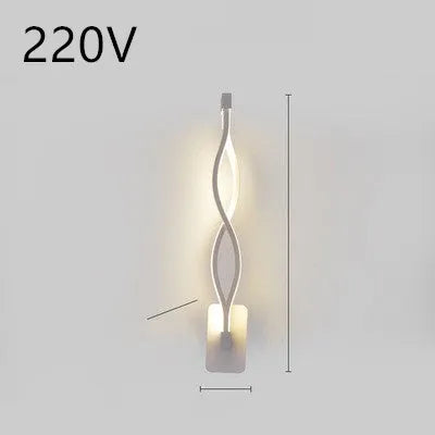 Minimalist Nordic design LED wall lamp with a silicone shade, mounted on a bedroom wall.