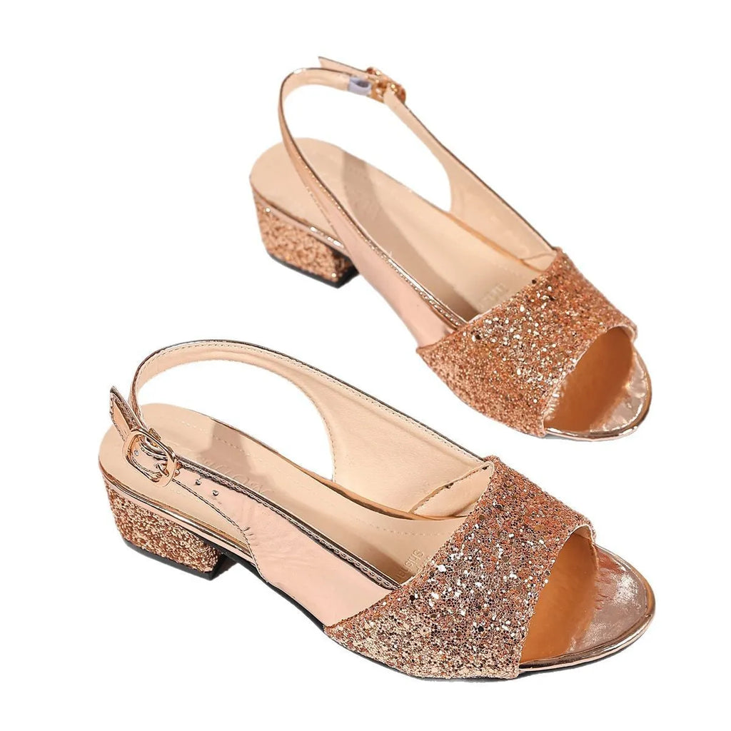 Gold open toe sandals with a buckle strap and fish mouth toe design on a white background.