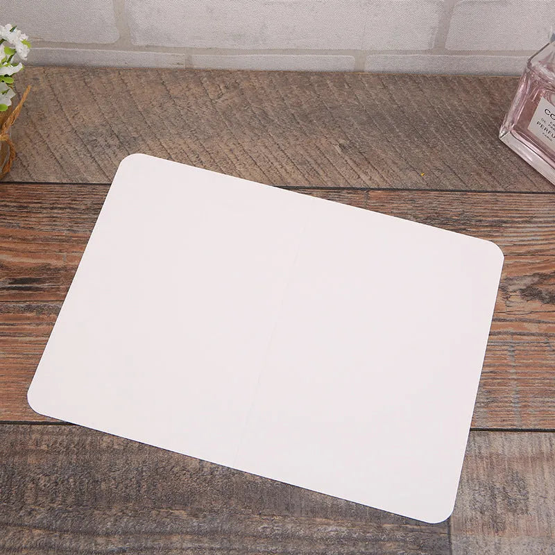 Pack of 100 blank folded kraft greeting cards in 10x15cm size, showing black, brown, and white colour options.