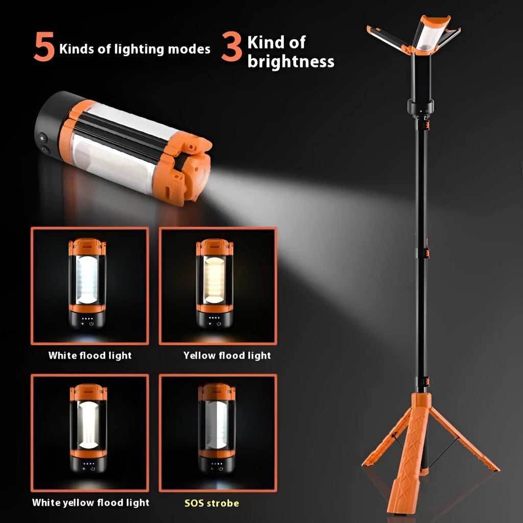 Retractable folding charging camping lantern in black and orange with bracket and pull string extended on a table