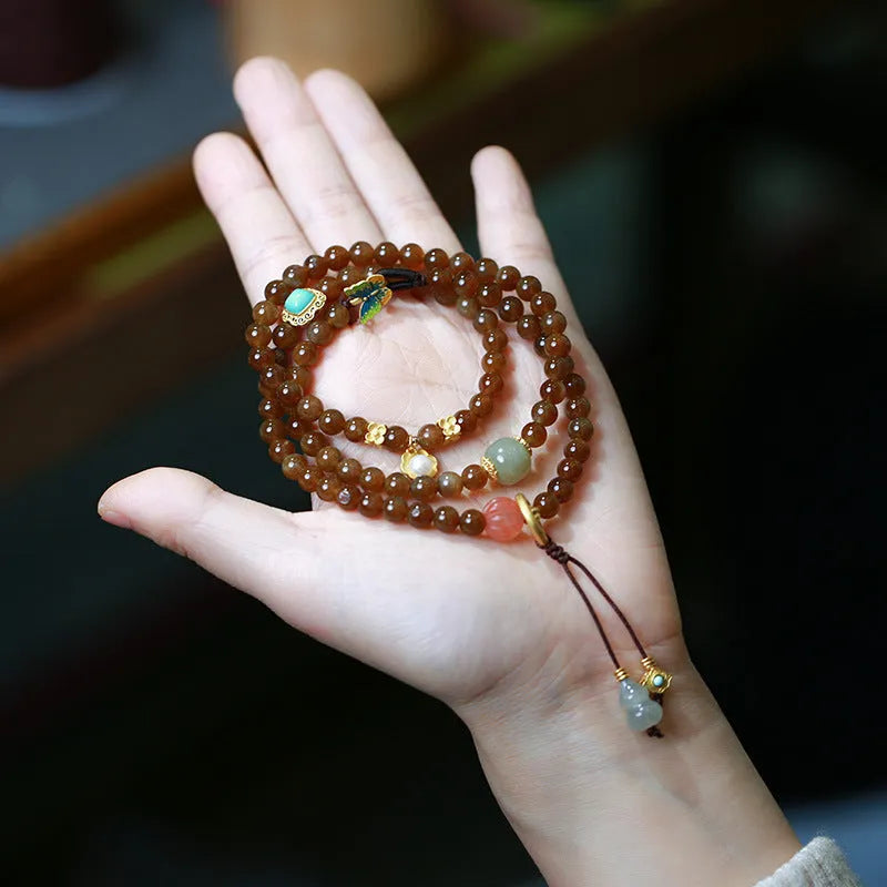 Brown jade Hetian jade three-ring bracelet with silver plated accessories, butterfly and gourd pearl motifs