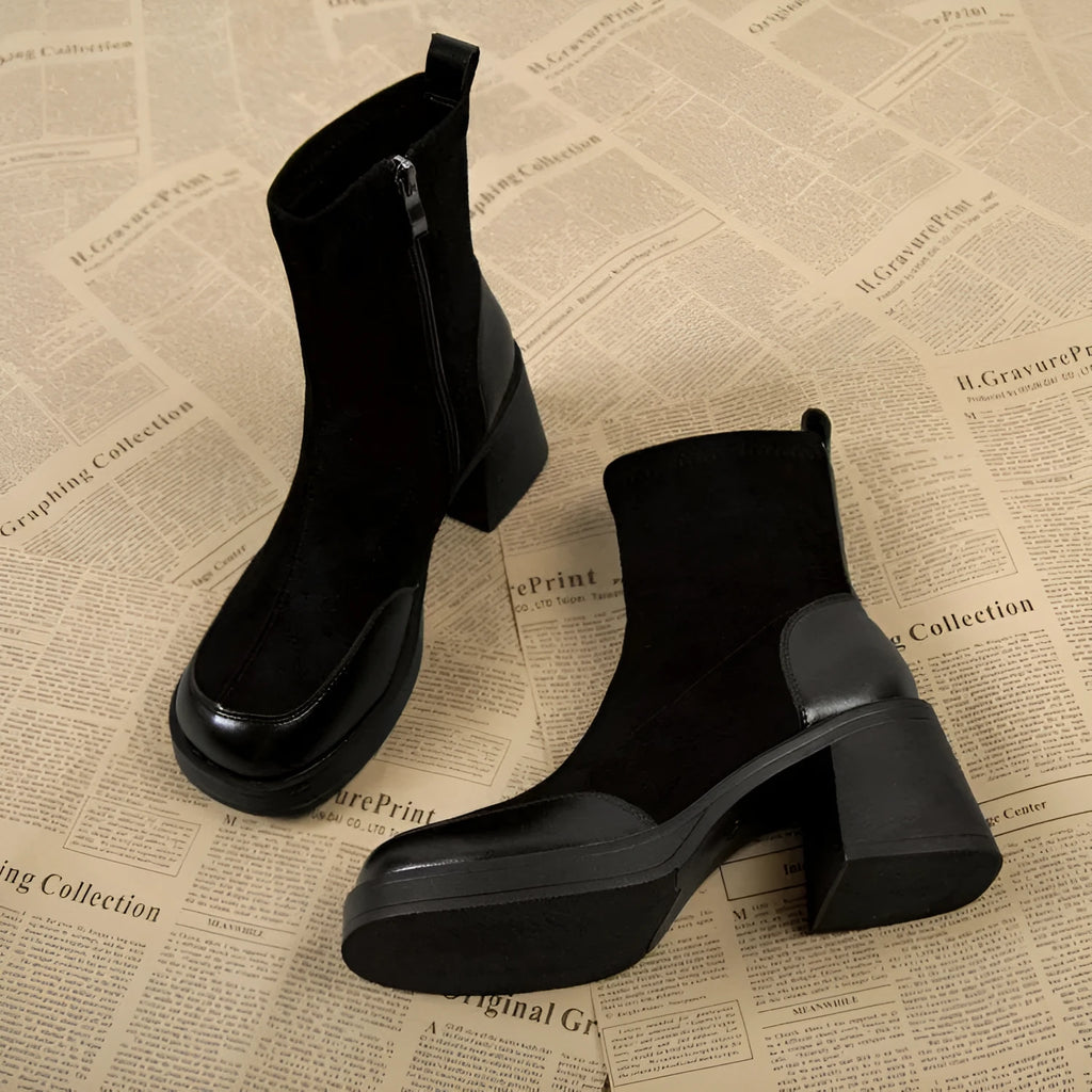 Thick bottom chunky heel Martin boots for women in black with lace-up fastening and rubber sole
