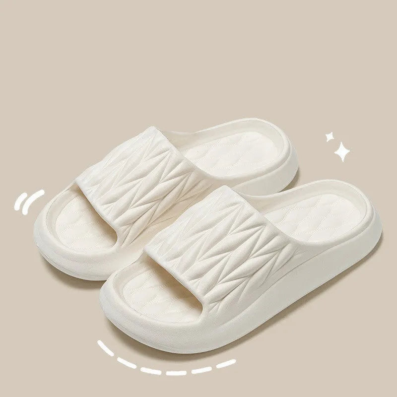Leaf texture design EVA slippers for indoor summer and bathroom use.