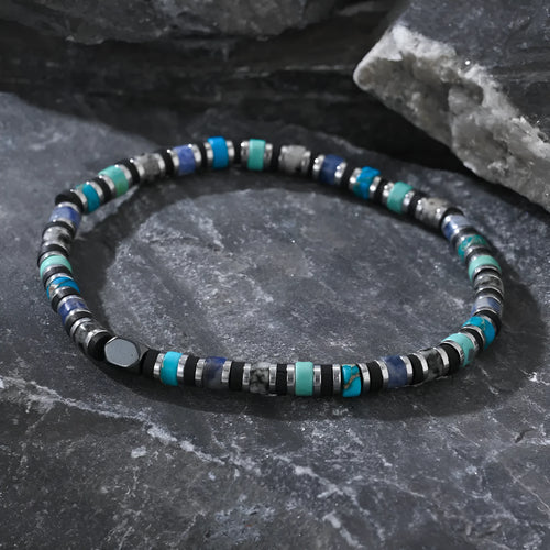 Hand-woven bohemian cylindrical bracelet with natural semi-precious stones in geometric arrangement