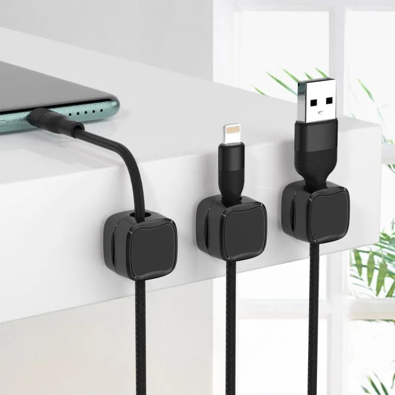 Magnetic cable management clips in white and black with adhesive backing