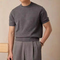 Round neck short sleeve knitted T-shirt in Tencel viscose blend available in black dark gray and white sizes XS to XXL