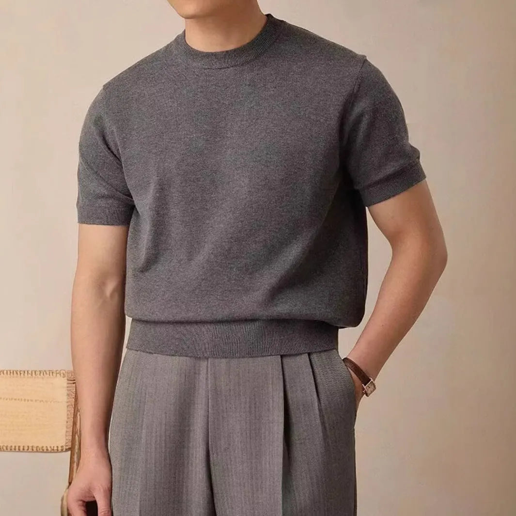 Round neck short sleeve knitted T-shirt in Tencel viscose blend available in black dark gray and white sizes XS to XXL