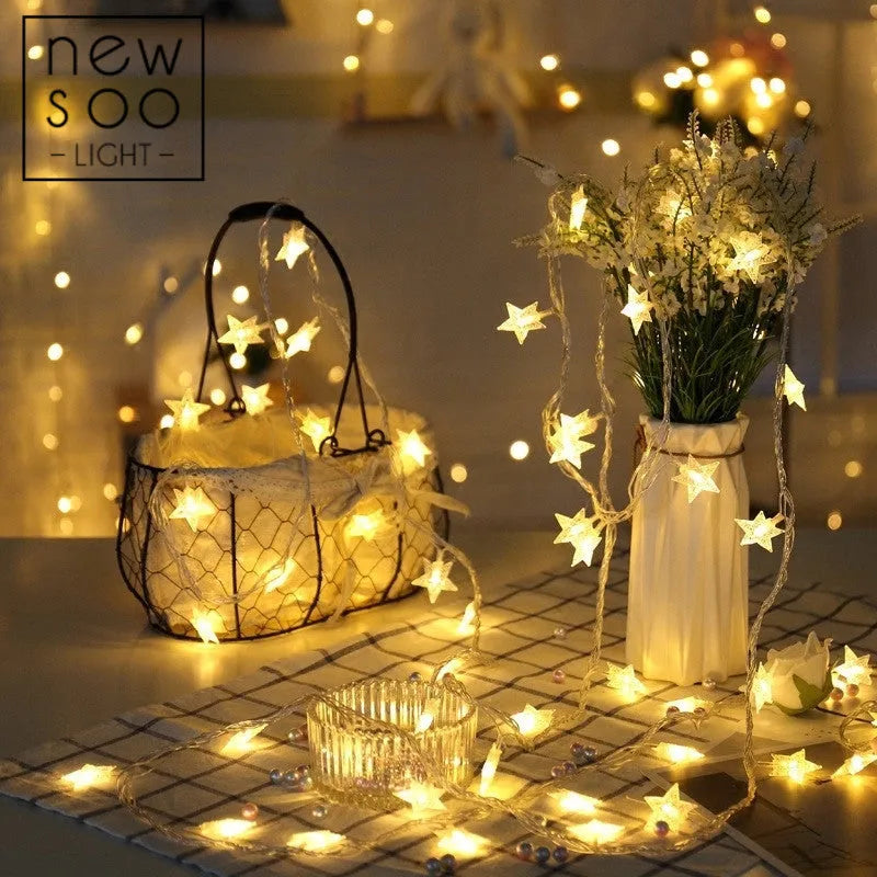 LED five-pointed star string lights with copper wire in warm white colour