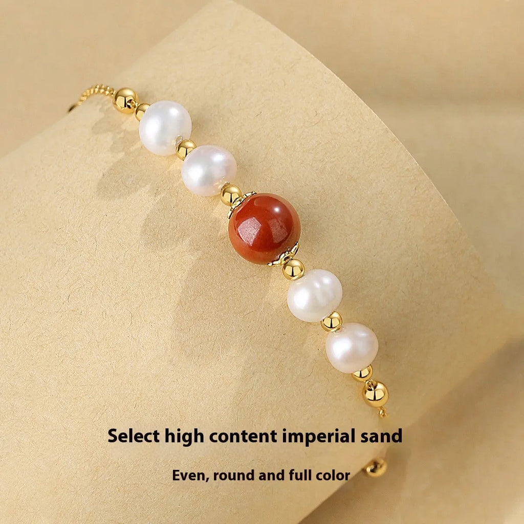 Yellow retro-style bracelet with red bean and cinnabar design on 925 silver band.