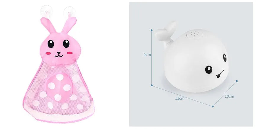 White and blue whale-shaped bath toy spraying water with LED lights on, floating in a baby bath