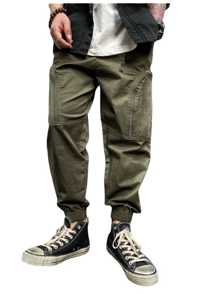 Men's loose fit cotton cargo trousers with elastic waist and zipper pockets in army green