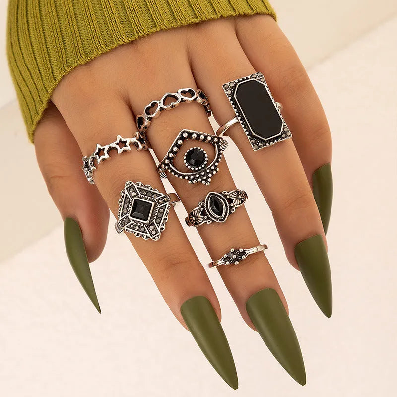 Alloy black gem U-shaped electroplated ring on display, silver colour option