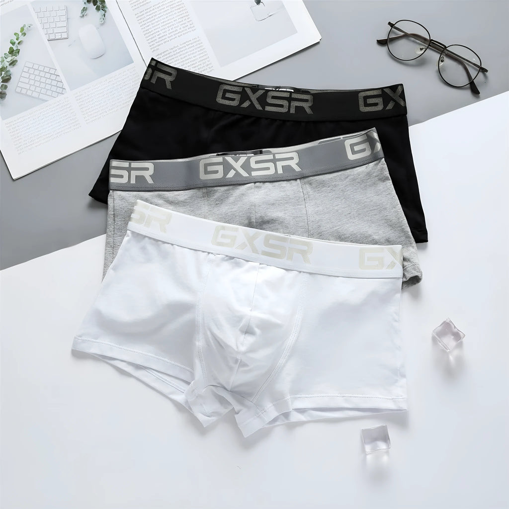 Men's purified cotton low waist boxers in solid colour available in black white and grey