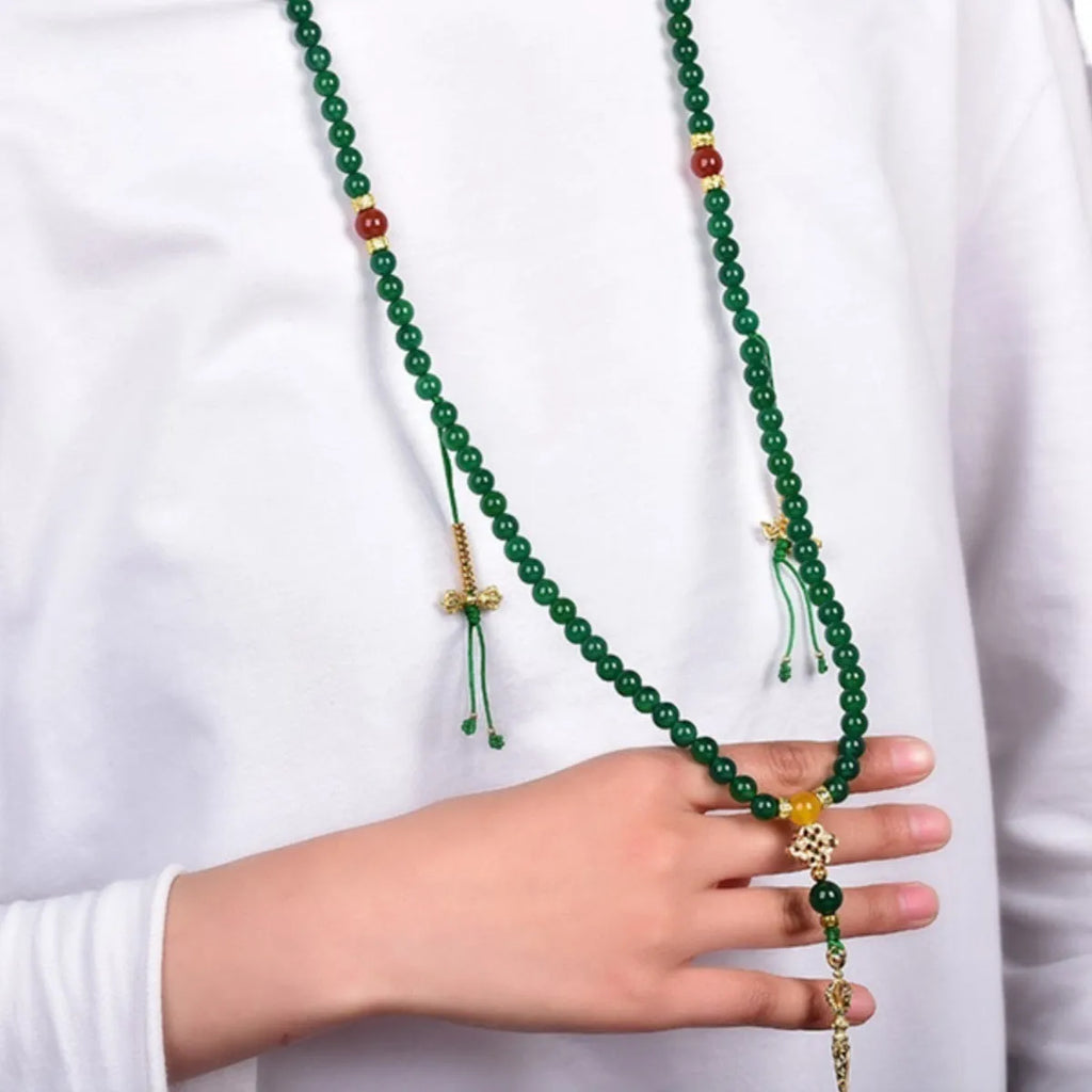Handmade multi-strand bracelet made with round green agate beads from Brazil
