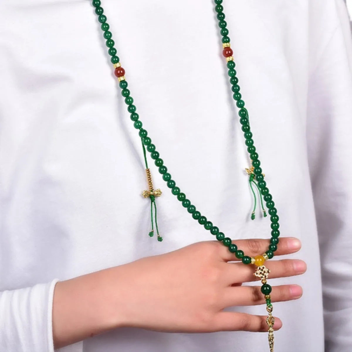 Handmade multi-strand bracelet made with round green agate beads from Brazil