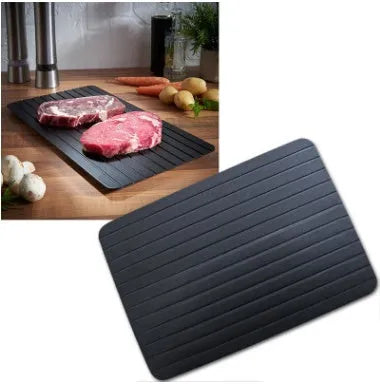 Black aluminium quick defrosting tray for thawing meat and frozen food without electricity.