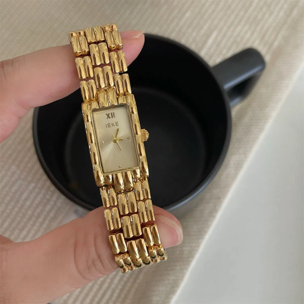 Women's mid-ancient style bracelet watch with spiral crown and mineral glass, available in gold and silver colour variations