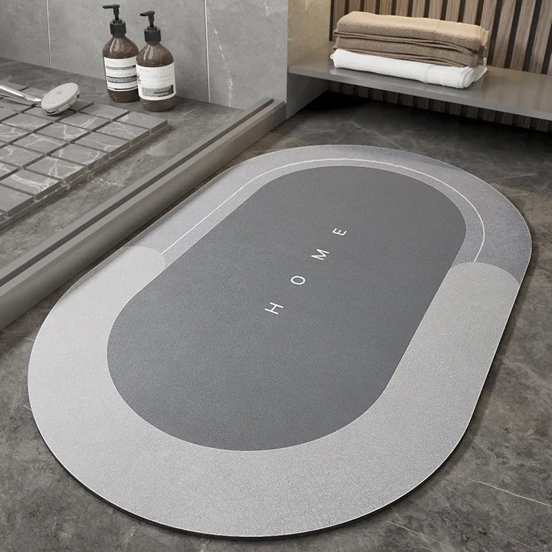 Blended fabric bathroom floor mat in blue, available in oval and rectangular shapes.