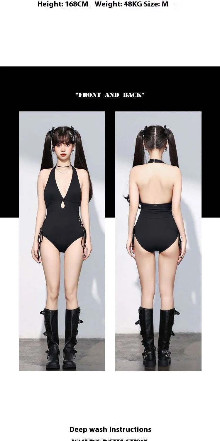 Black women's one-piece swimsuit with V-neckline and hollow strap design on mannequin
