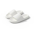 Unisex EVA injection moulded indoor slippers with floral detail, available in multiple colours