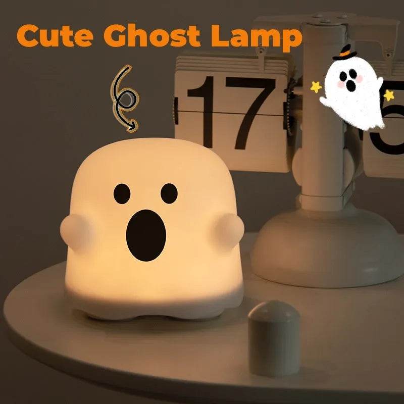 White silicone bedside night light with touch sensor base on wooden table