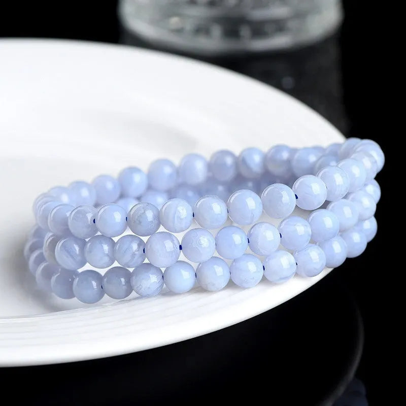 Blue striped agate bracelet with three circles of 6-6.8mm beads in unisex design