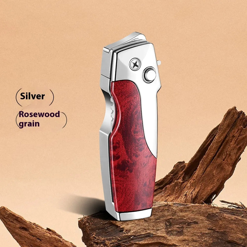 Zinc alloy metal folding lighter tool with integrated knife, shown in a carbon fibre finish.