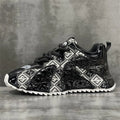 Men's black casual platform shoes with round toe, lace-up front, and rubber sole