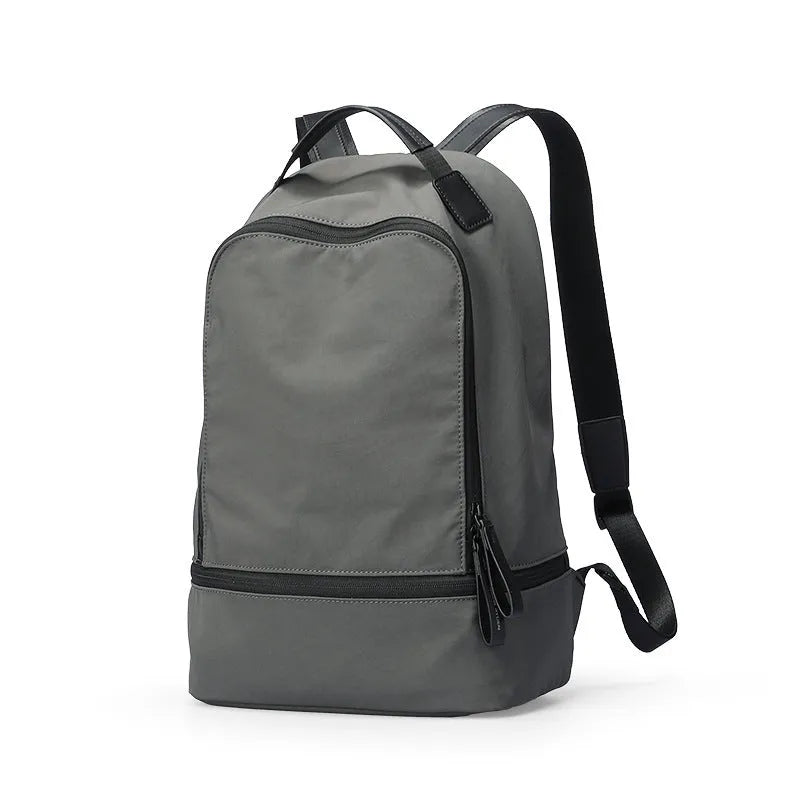 Light travel leisure backpack in Oxford cloth with below 20L capacity shown in blue black colour